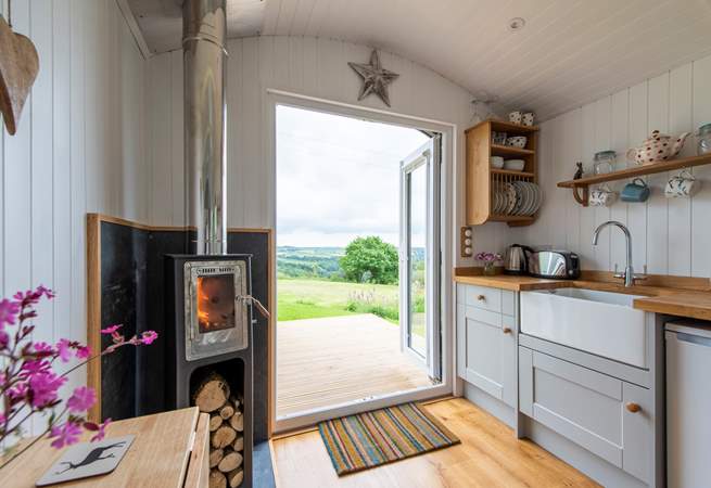 The pretty kitchen-area is fully equipped for your glamping holiday needs.