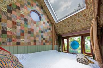 The comfortable bed has a four-poster feel and enjoys the same glorious country outlook.