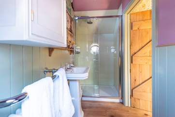 Complete with hot and cold running water and proper flushing loo.