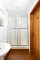 The step into the en suite shower is approx thirteen inches.