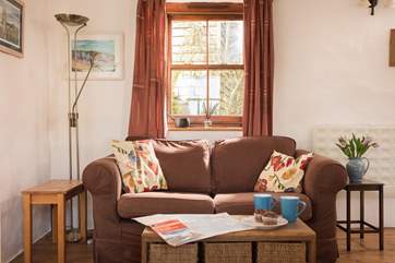The sofa converts into a bed, offering more flexible sleeping arrangements if required.
