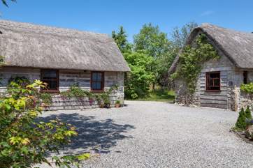 West and East Barn are both detached and located near to one another.