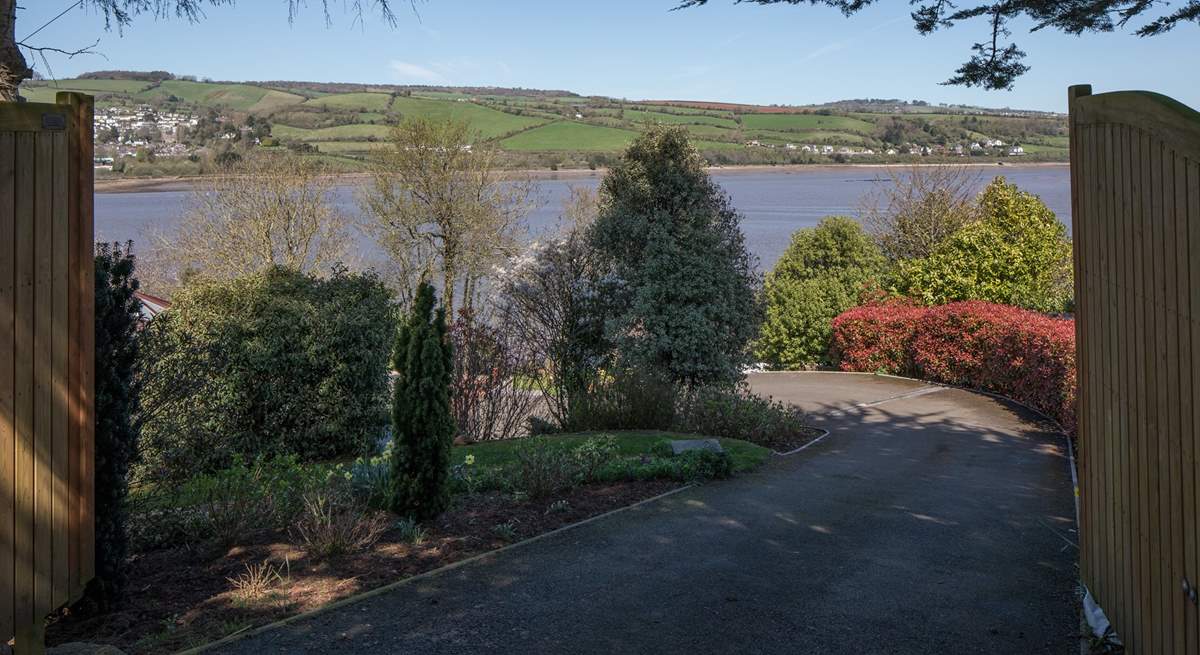 The main gates lead you down your private driveway to the parking-area below. What a view to start your holiday off with!