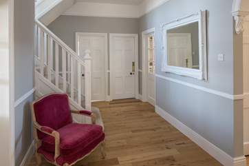 Meadowcliff is linked by this ground floor hallway, which leads to the stairs and up to the first floor.