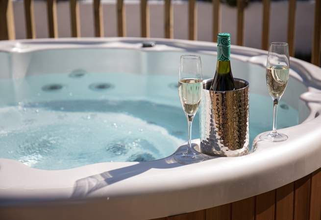 Anyone for a glass of something tasty whilst soaking in the bubbles and sunshine?