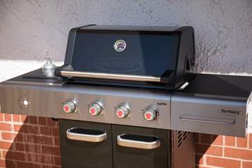 A gas barbecue is in a prime position to feed the hungry hordes.