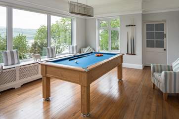 The games-room houses this wonderful pool table. Hours of fun to be had here whilst looking out over the water.