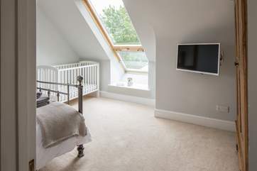 Peeking into Bedroom 5 from the large first floor landing.