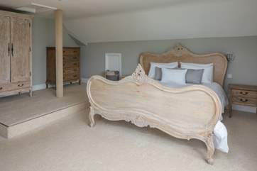 The master bedroom is super spacious. Please watch the step when accessing the wardrobe.
