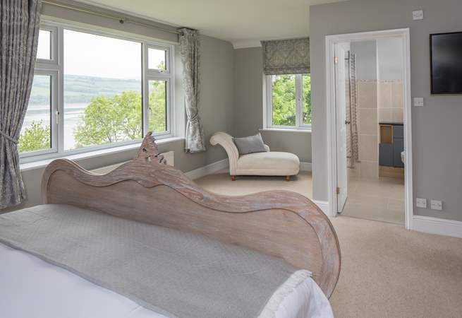 Fabulous views over the water and garden can be enjoyed from the master bedroom.