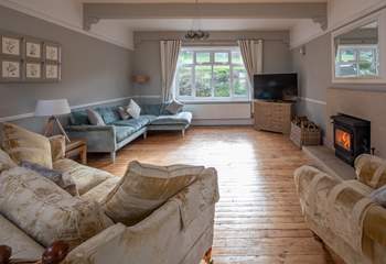 The main sitting-room boasts a glorious wood-burner. Perfect for those snuggly nights in.