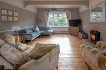 The main sitting-room boasts a glorious wood-burner. Perfect for those snuggly nights in.
