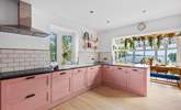 The stunning pink kitchen will wow the most discerning chef. - Thumbnail Image