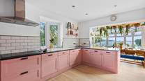 The stunning pink kitchen will wow the most discerning chef.