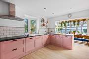 The stunning pink kitchen will wow the most discerning chef.