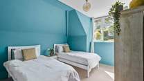 Bedroom 4 has twin beds, ideal for either children or adults.
