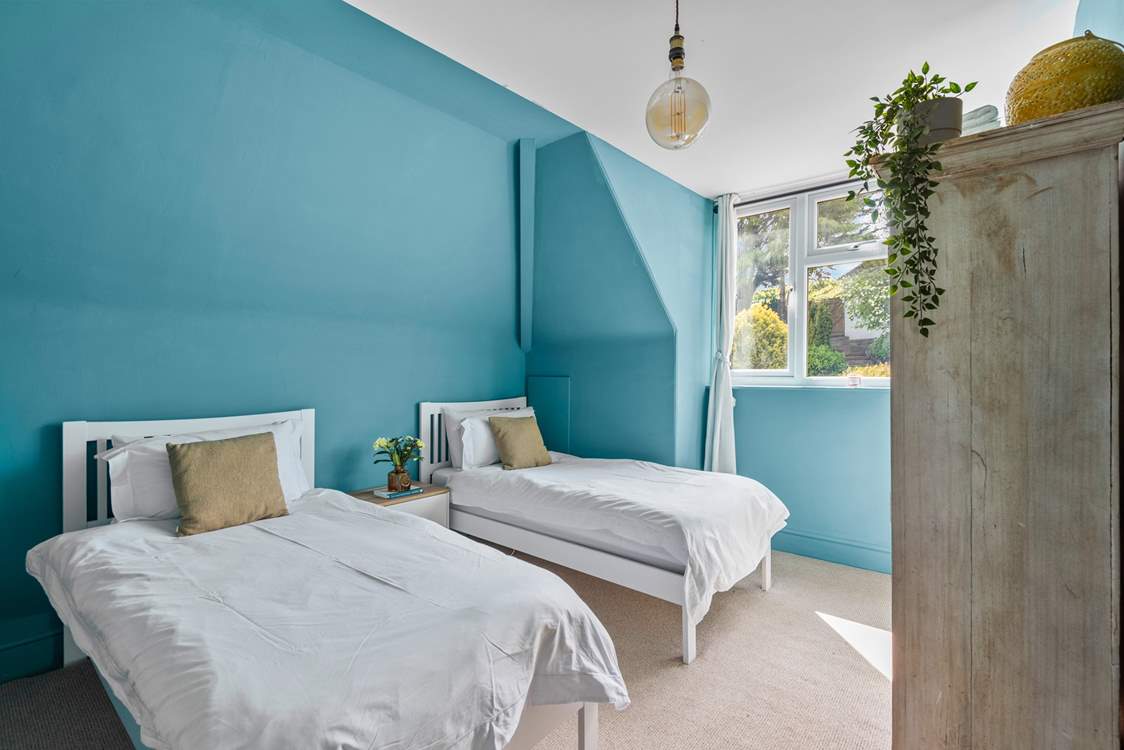 Bedroom 4 has twin beds, ideal for either children or adults.