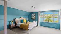 Each bedroom is luxuriously furnished. This is the beautiful main bedroom.