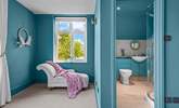 Bedroom 2 has a stylish en suite shower-room, and a chaise longue for quiet moments. - Thumbnail Image