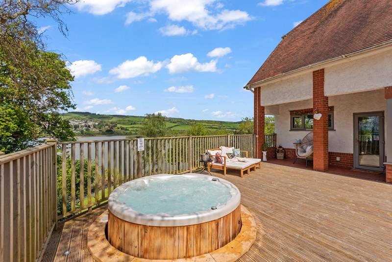 Soak away in the hot tub and watch the tide ebb and flow over the estuary.