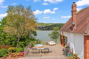 The large deck has all you need for a blissful holiday including a hot tub, barbecue and the most splendid views.
