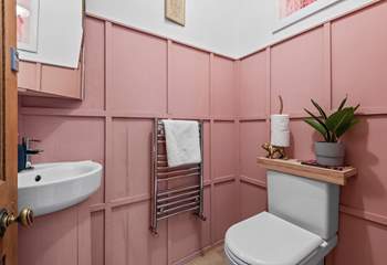 The ground floor cloakroom is pretty in pink!
