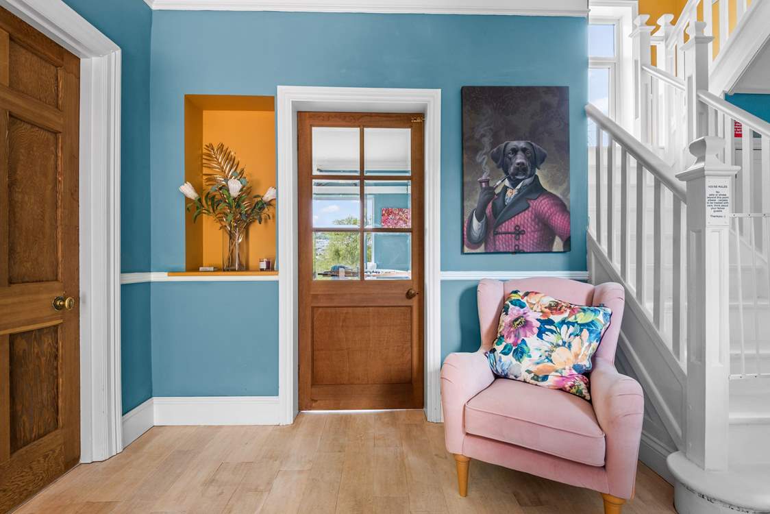 Quirky artwork marries beautifully with the vibrant colour scheme here.