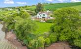 The estate has direct access to an estuary beach at low tide, and with direct step access it is a perfect place to launch your boat or paddleboard. - Thumbnail Image