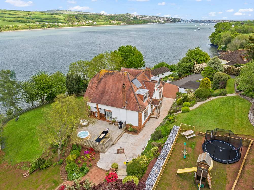 Welcome to Meadowcliff, a magnificent waterside holiday home with fabulous outside deck and new play area.