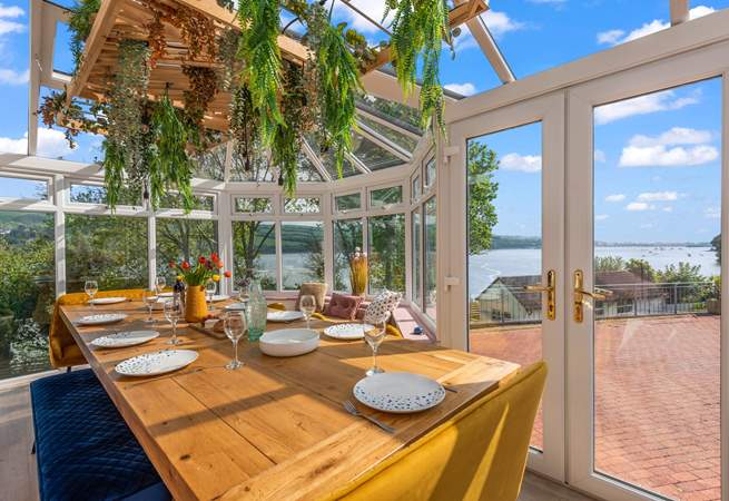 The dining-table has a stunning view towards Shaldon and Teignmouth.