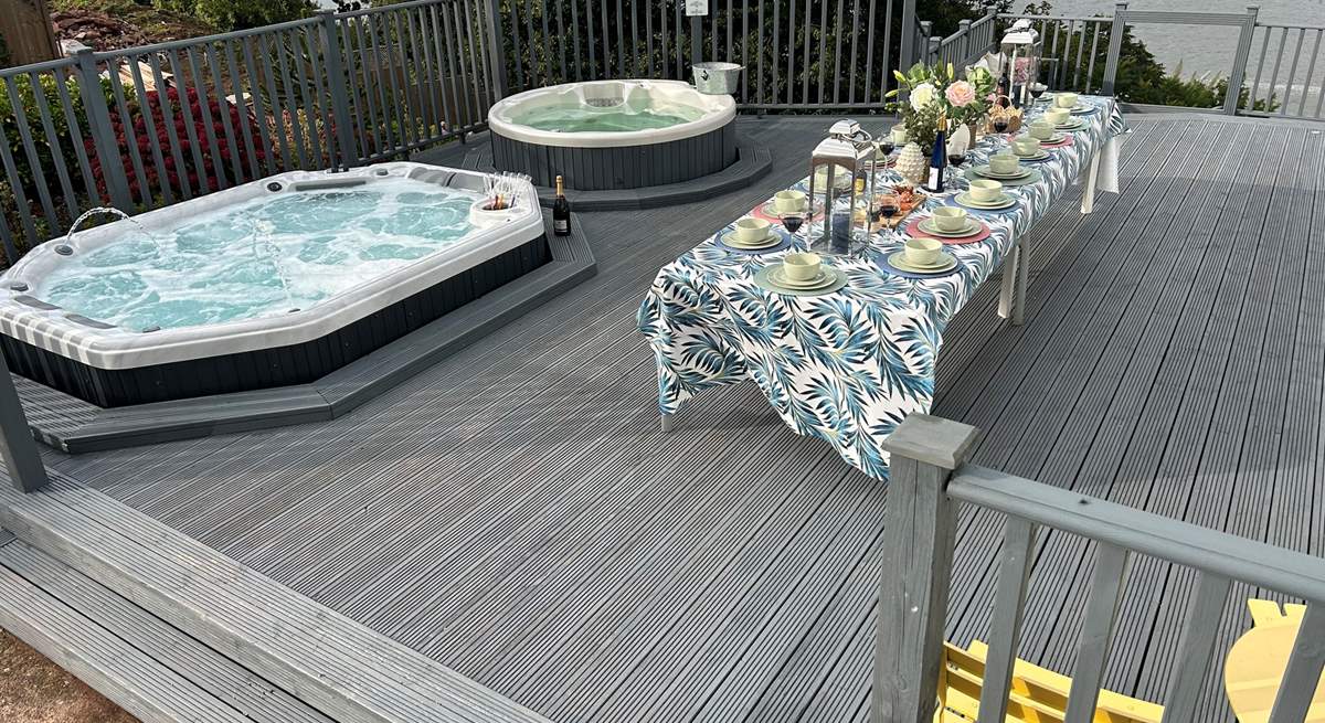 The large deck has all you need for a blissful holiday including two hot tubs, barbecue and the most splendid views.