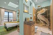 The stunning en suite shower-room for bedroom 8.