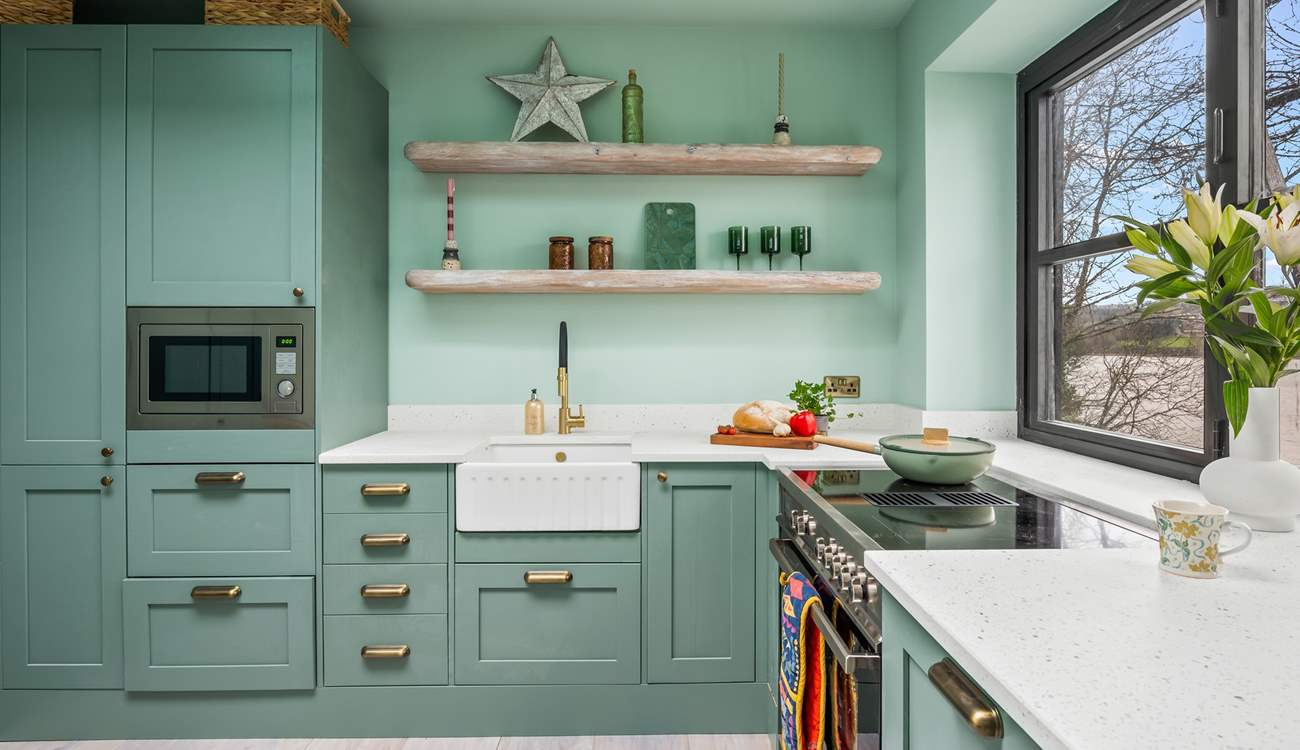 The well equipped kitchen is such a pleasant place to whip up any meal.