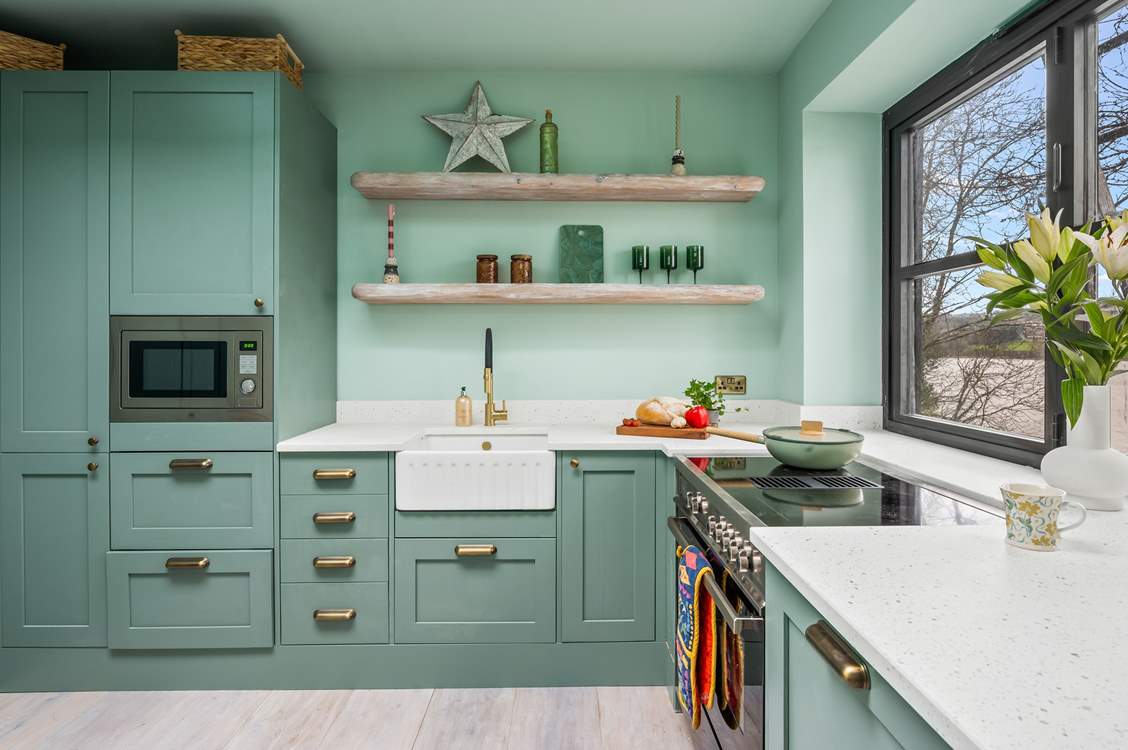 The well equipped kitchen is such a pleasant place to whip up any meal.
