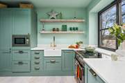 The well equipped kitchen is such a pleasant place to whip up any meal.