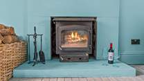 The chillier evenings are easily dealt with by this glowing wood-burner.
