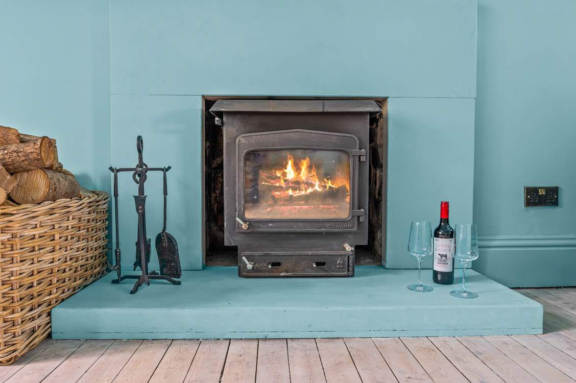 The chillier evenings are easily dealt with by this glowing wood-burner.