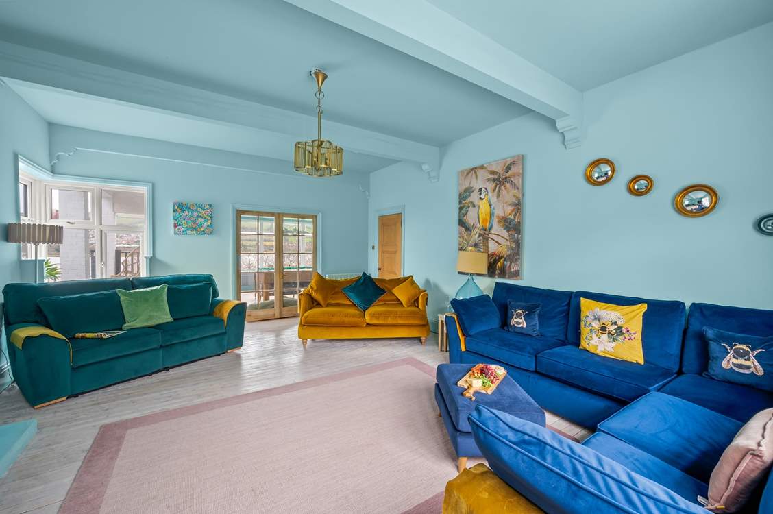 The sitting-room has oodles of space and a Smart TV so you can catch up on the latest movies.