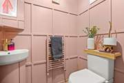 The ground floor cloakroom is pretty in pink!
