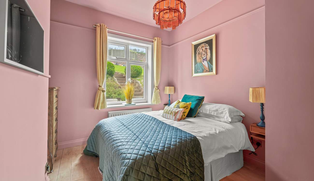 Bedroom 1 is on the ground floor and has a lovely outlook of the garden.