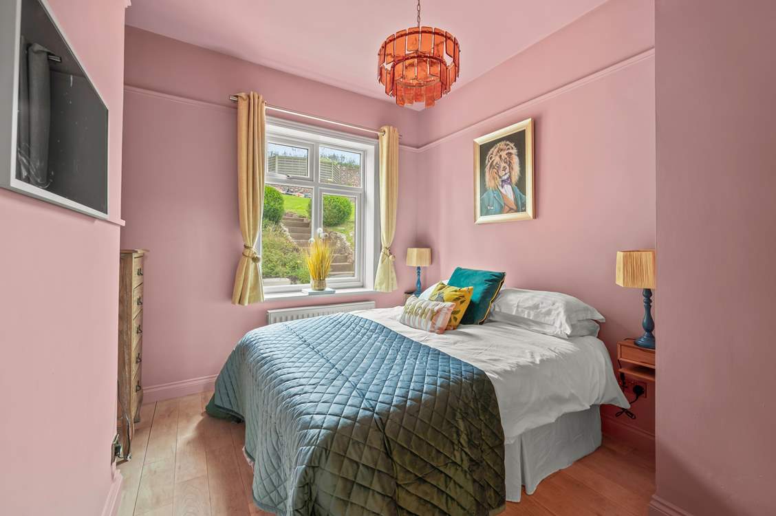 Bedroom 1 is on the ground floor and has a lovely outlook of the garden.