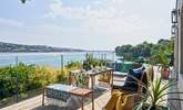 Step out onto the fabulous decked area and enjoy al fresco dining with magnificent views as your backdrop.  - Thumbnail Image