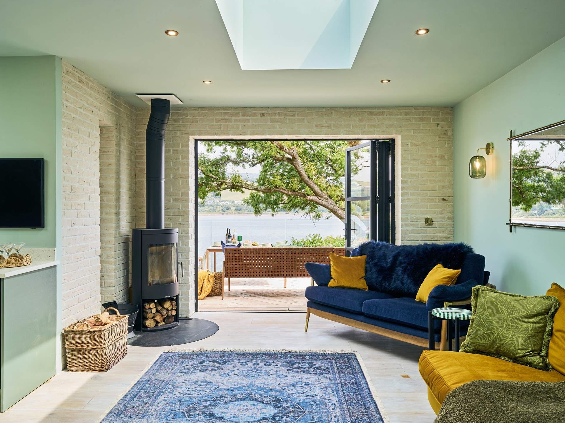 Snuggling up in front of the wood-burner, enjoying such fabulous waterside views is simply glorious.
