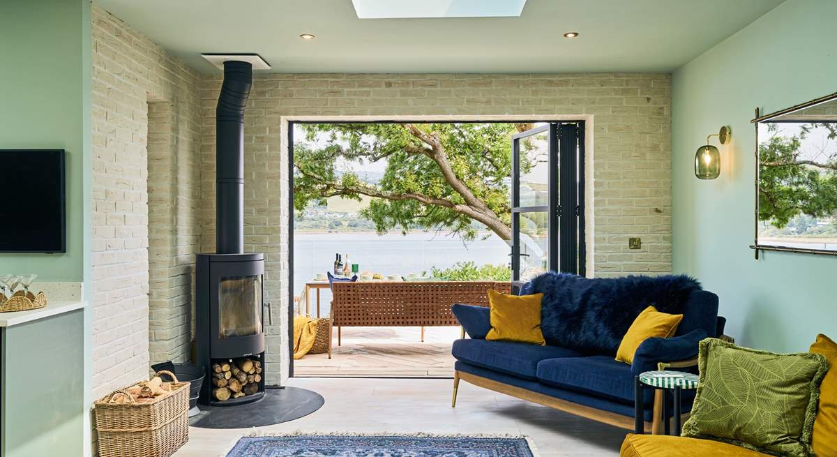 Snuggling up in front of the wood-burner, enjoying such fabulous waterside views is simply glorious.