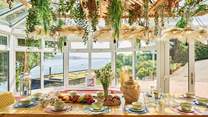 Enjoy sociable dining with a stunning waterside view.