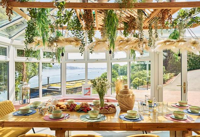 Enjoy sociable dining with a stunning waterside view.