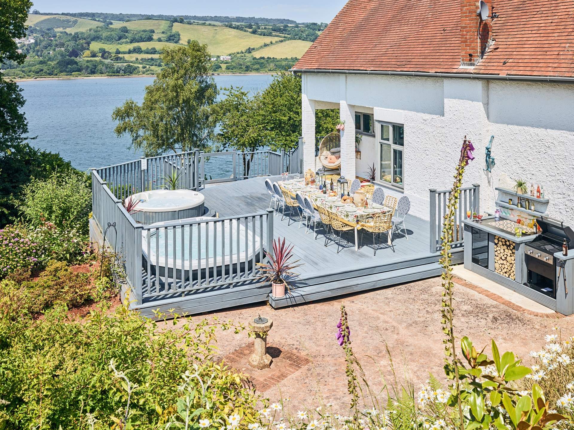 The large deck has all you need for a blissful holiday including two hot tubs, barbecue and the most splendid views.