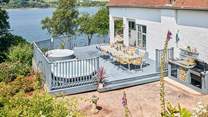 The large deck has all you need for a blissful holiday including two hot tubs, barbecue and the most splendid views.