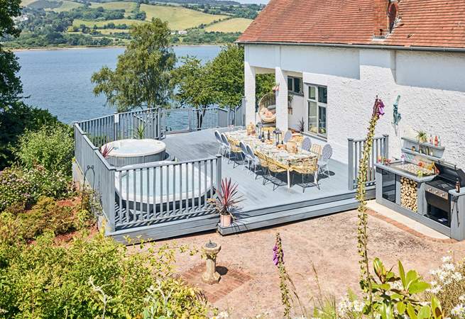 The large deck has all you need for a blissful holiday including two hot tubs, barbecue and the most splendid views.