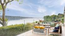 Step out onto the fabulous decked area and enjoy al fresco dining with magnificent views as your backdrop. 